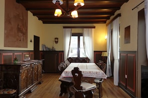 The beautiful living room with East South and West windows that ensure light all day