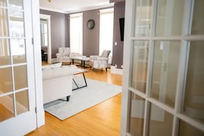 Beautiful Tall French Doors leading into Living Room