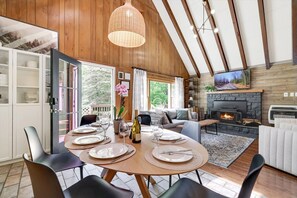 Gather with your loved ones in our open concept living  and dining area for 8!