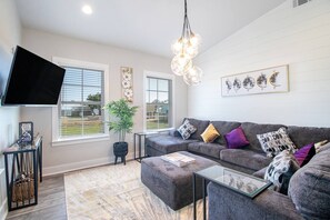 Enjoy family time on this comfy sectional with more than enough room for the entire family. Relax and watching your favorite shows or enjoy the beach view.