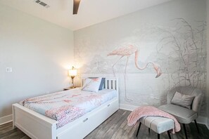 BeachGetaway: Colorful Bedroom with Twin and Full Memory Foam Beds, Nintendo Game System, and Stunning Beach Views - Perfect for a Fun-Filled Vacation