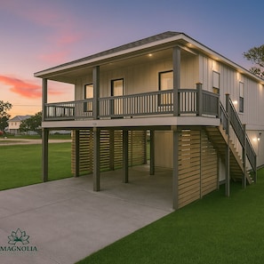 Unwind in style at this elevated retreat, where modern charm meets serene sunsets and peaceful evenings on the porch.