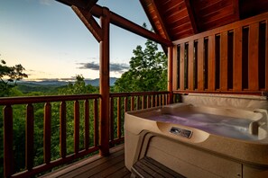 Sit back and relax in your private outdoor hot tub, with a view!