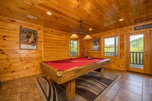 Lower level entertainment room with pool table