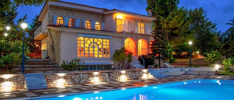 Villa exterior at night