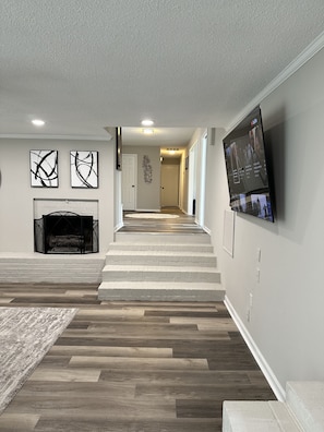 The "Luxe Lounge" Enjoy the large, deep sofa and enjoy the 72" Smart TV!