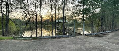 Front porch view of the pond and sunset