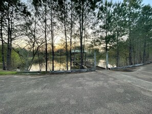 Front porch view of the pond and sunset