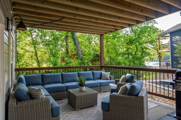 Patio with lake view and bbq grill