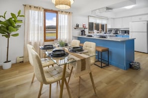 Added kitchen stools to keep people together.