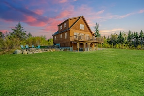 Our cabin beneath a summer sunset, on the side of a mountain, incredible views