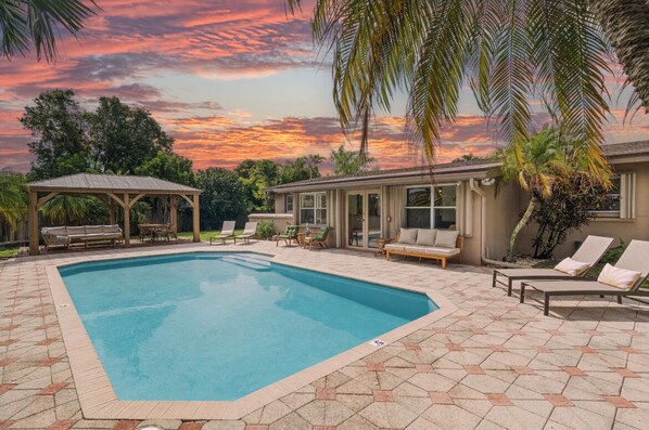 Pool side paradise, private backyard, and plenty of room areas to lounge.