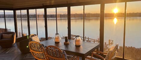 Enjoy the sunrise over the river from the enclosed sunroom


