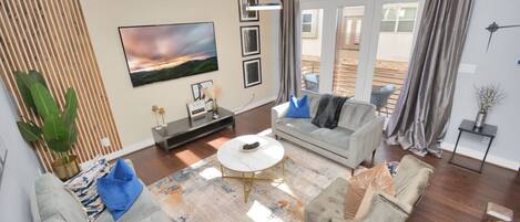 Grand Living room with 12 foot high ceiling