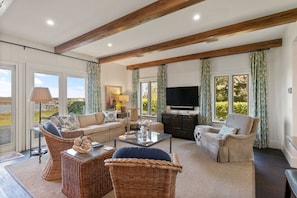 Great Room--Den with seating area, TV and gorgeous marsh views