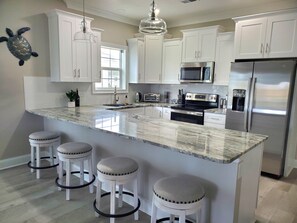 Center Island 11' Long Granite! All cookware, Ice and water in New SS Fridge.