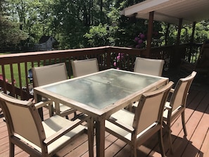 Deck with patio table, Holland grill, & Traeger smoker