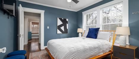 Guest room - flat screen tv, dual night stands, and a comfortable queen bed