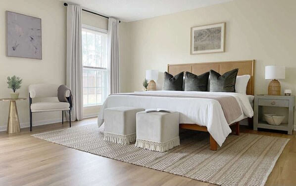 Welcome to your 1st floor master suite.  It is large, but warm and cozy.  The king bed has a 12 inch memory foam mattress for you to melt into.  You will also have easy access to the laundry room, which is attached to this room for your convenience.