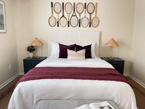 A queen bed, fun decor, and comfortable sheets - this room will make your stay memorable.  Your guests will talk about this time for years to come.  All thanks to you for choosing this property!  