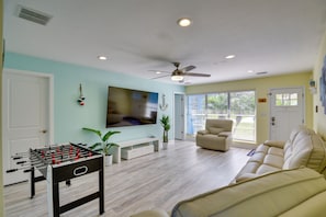 Living Area | Queen Air Mattress | Smart TV w/ Cable | Foosball Table