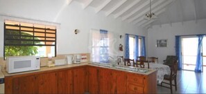 Open plan Kitchen/Dining and living room, with views of the ocean/harbour