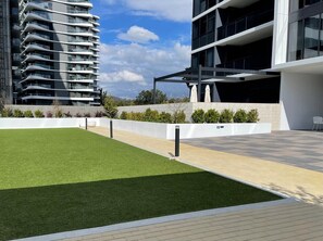 On ground floor walk out to the pool and BBQ area or kick a ball with the kids.