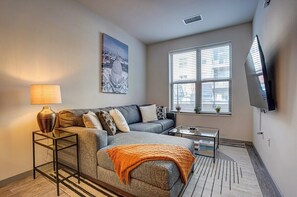 Experience the perfect blend of comfort and entertainment in our stylish living room with a 65" Roku Smart TV. 