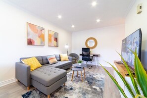 Create memories with your friends and family in this bright and Cozy living room!