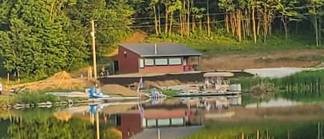 The cottage as seen from Still Valley Lake before landscaping.