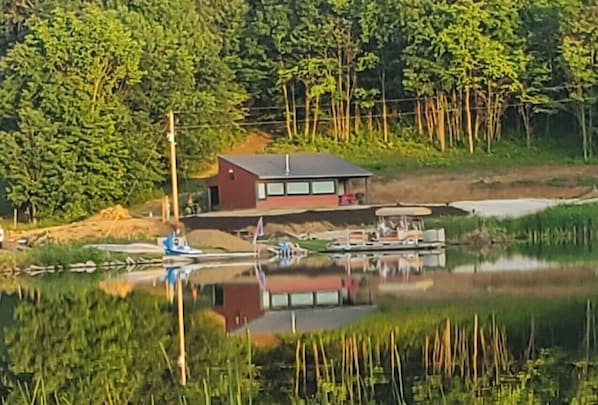 The cottage as seen from Still Valley Lake before landscaping.