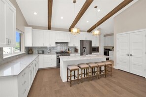 Full kitchen with two dishwashers.