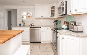 Fully stocked kitchen with the all the supplies you need.