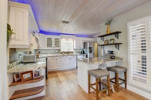 Clean and modern gourmet kitchen with all new stainless steel appliances. 