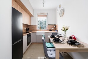 The kitchen's modern appliances make meal preparation easy.