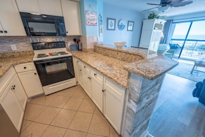 Kitchen Area with Full Sized Appliances and View of Ocean!