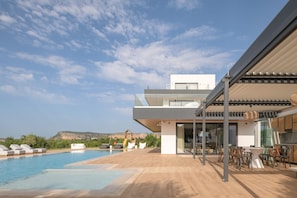 The outdoor pool area to enjoy as dusk falls.