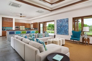 The living room, on the other hand, is a comfortable retreat where relaxation takes center stage.