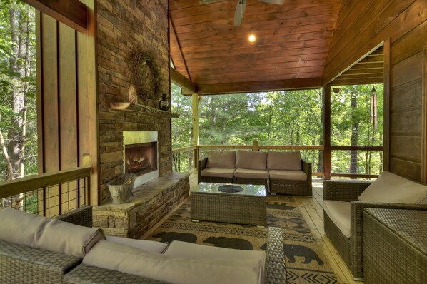 Enjoy the feel of sitting in a treehouse while visiting the Papa Bear Lodge cabin rental in Blue Ridge 