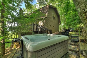 Soak in the hot tub in total privacy at this luxury cabin rental