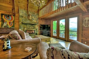 Comfy seating in the living room area, complete with a view!!