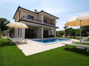 poolside with sunloungers