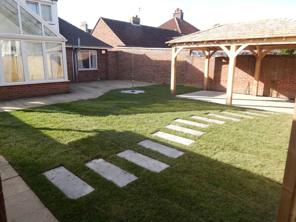 Rear garden and outside resting/ BBQ area