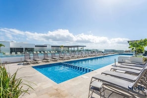 Unwind by our stunning rooftop pool. Soak up the sun and enjoy the ocean views!