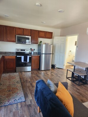 open floor plan living room/dining/kitchen 