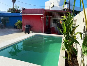 The pool is shared with 3 other units.  It measure 8wide x 16long x 5deep.