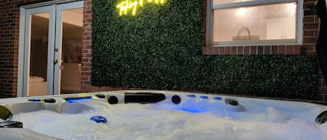 Welcome to the Hot Tub, which seats 6 at a time and comes with a towel valet!