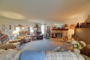 Living Area | Queen Sleeper Sofa | Flat-Screen TV w/ Cable | Organ | Books