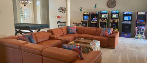 Upgraded living room now features an Arcade!  Head to head Fast and Furious, Dragons Lair, Marvel vs Capcom 2, Joust, and Ms Pacman machines include additional games as well.