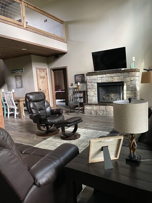 Warm and inviting Gas Fireplace, Large Smart TV and FREE Internet
